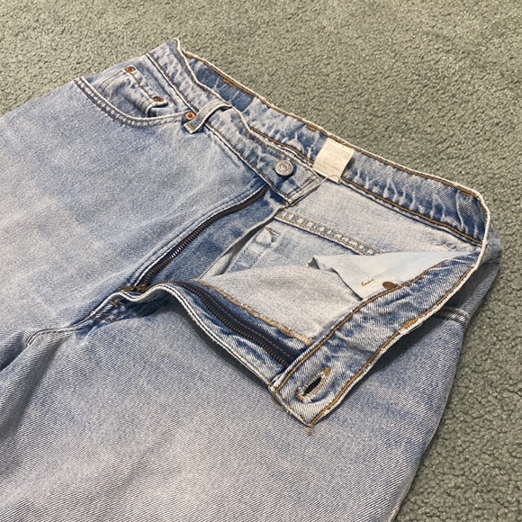 90's Vintage 550 Levi's Relaxed Fit with Tapered Leg faded blue jeans USA made - Picture 3 of 11